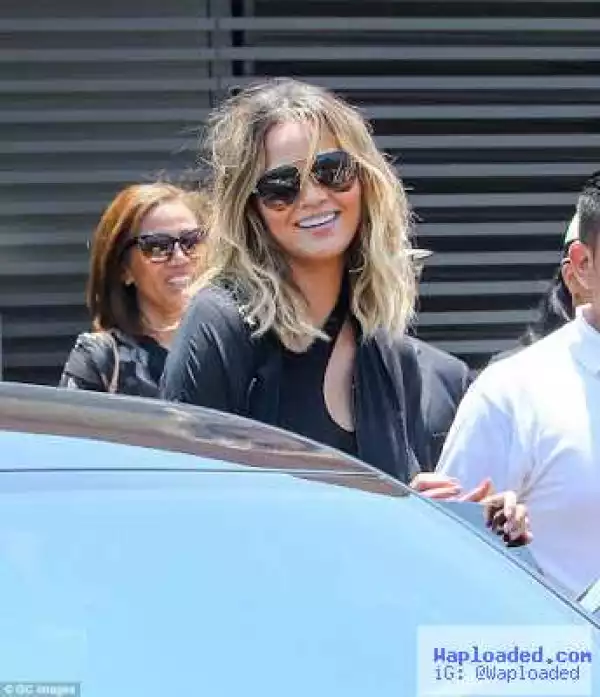 Photos: Chrissy Teigen steps out in matching colour with husband John Legend for brunch